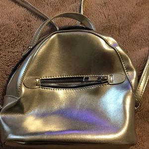 Small silver back pack